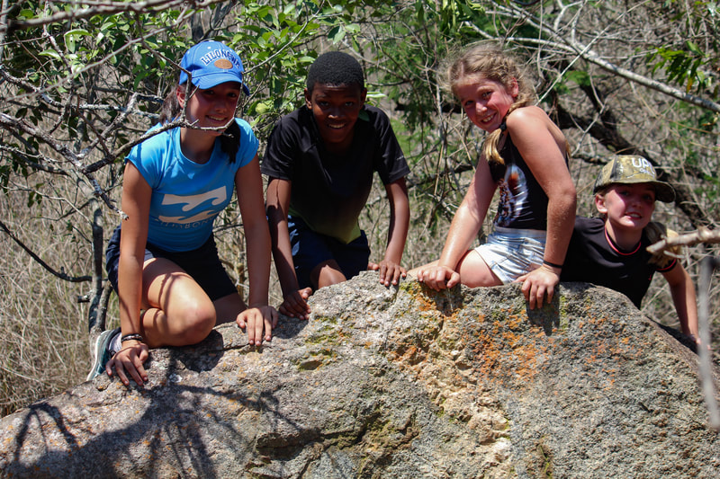 Youth Adventure Kids Camps children outdoor learning explore eswatini activities - amazing race rock climbing