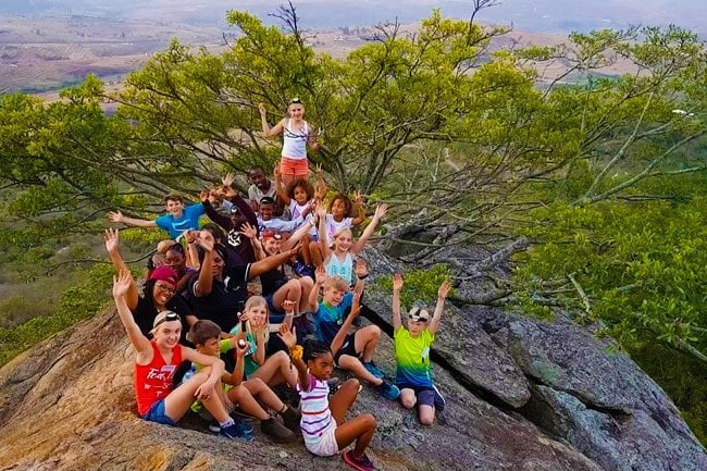 Youth Adventure Kids Camps children outdoor learning explore eswatini team activities sundowners rock climb for view